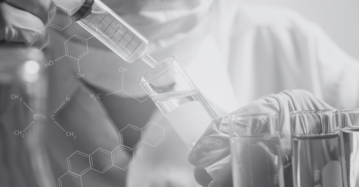 Lab Startup and Optimization Services - test tubes scientist using syringe to fill test tubes